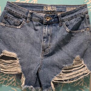 American Rewash, distressed blue jean shorts.